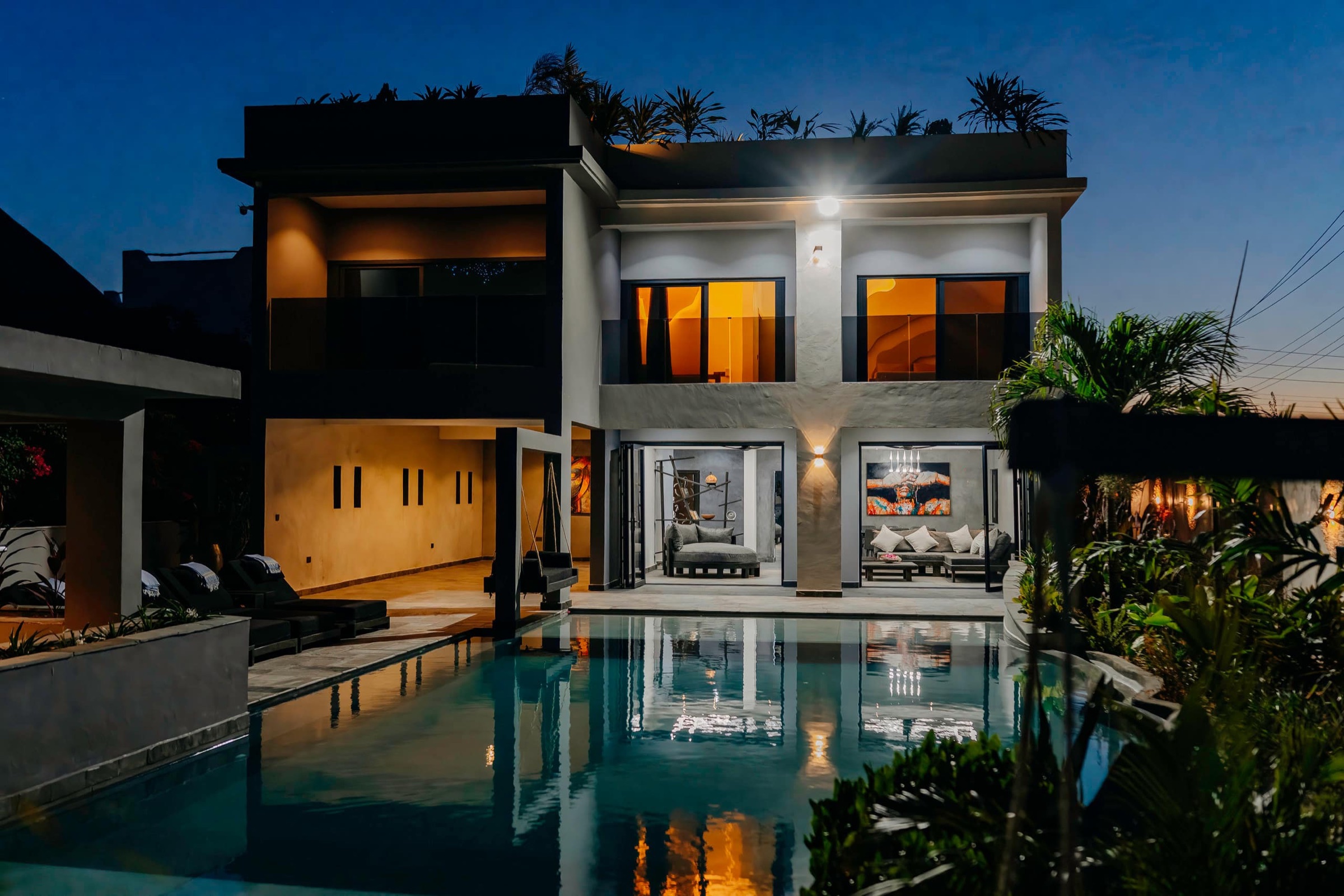 The WAZO Villa pool at dusk